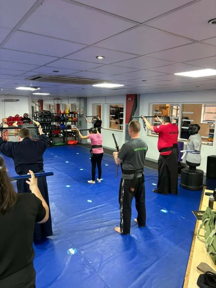 Students training on the mats at The Black Belt Foundation Chorley