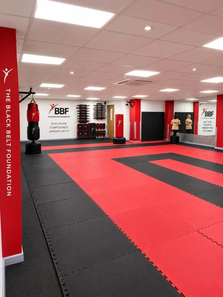 Red and black matted training area The Black Belt Foundation Chorley